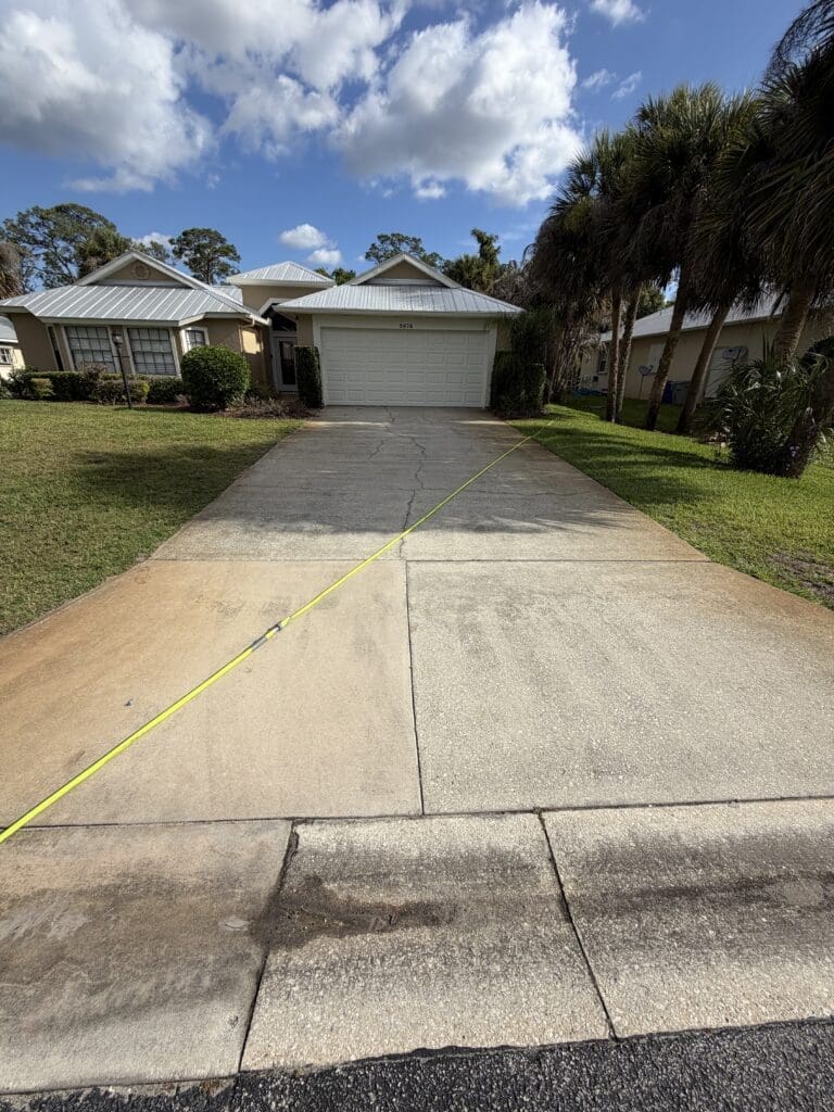 Concrete driveway after pressure washing in Orlando FL