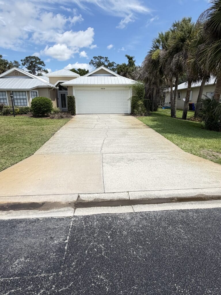 Clean residential driveway after surface cleaning in Orlando